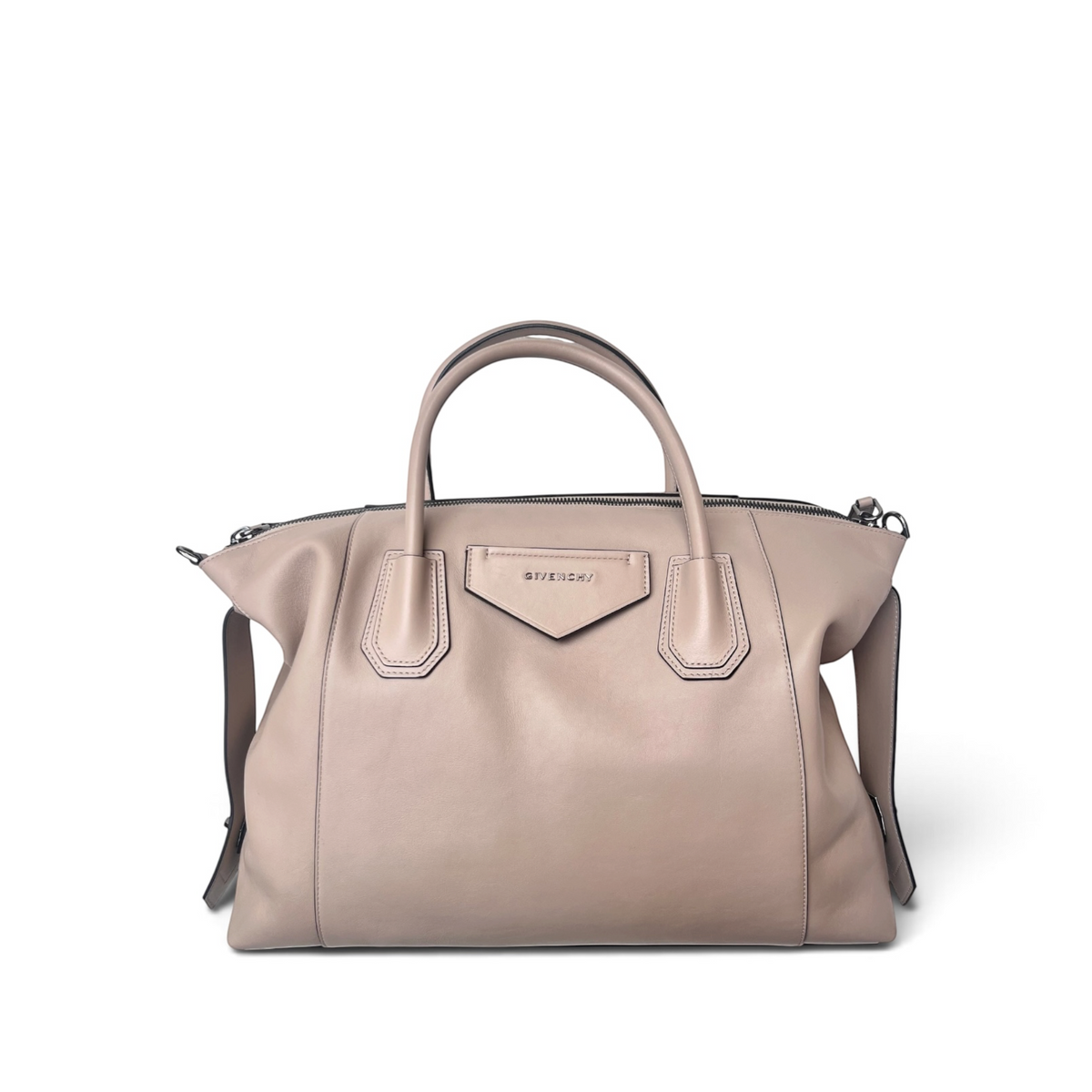 Borsa a mano Givenchy in pelle liscia color nude con logo impresso e doppi manici, proposta da shapemilano