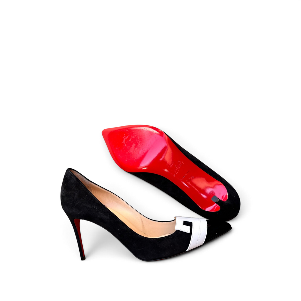 Décolleté Christian Louboutin di shapemilano in camoscio nero con punta bianca, tacco a stiletto e suola rossa