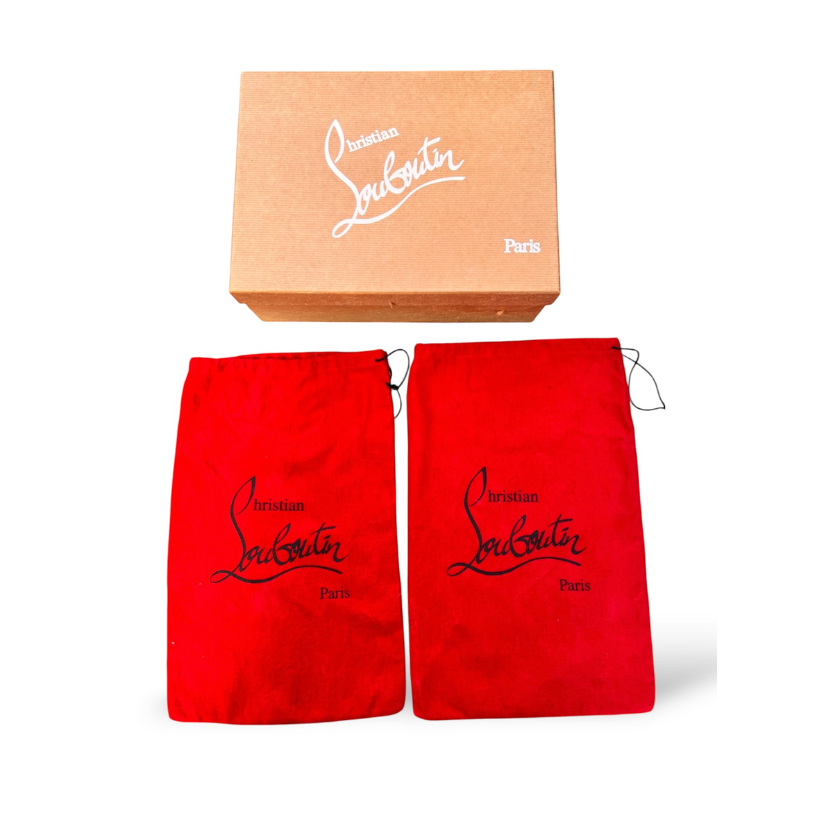 Scatola originale e due sacchetti antipolvere rossi firmati Christian Louboutin venduti da shapemilano